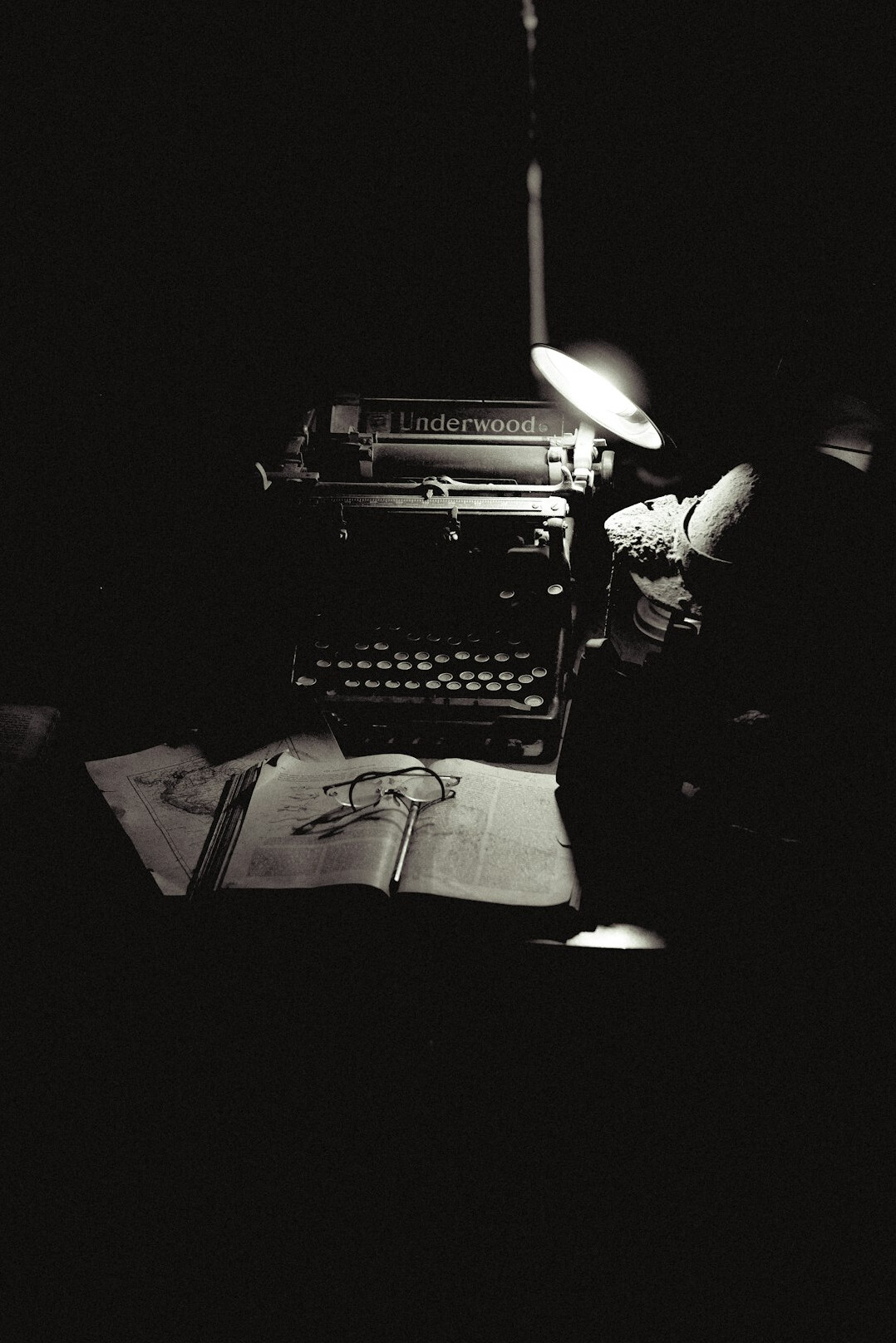mystery writer at typewriter
