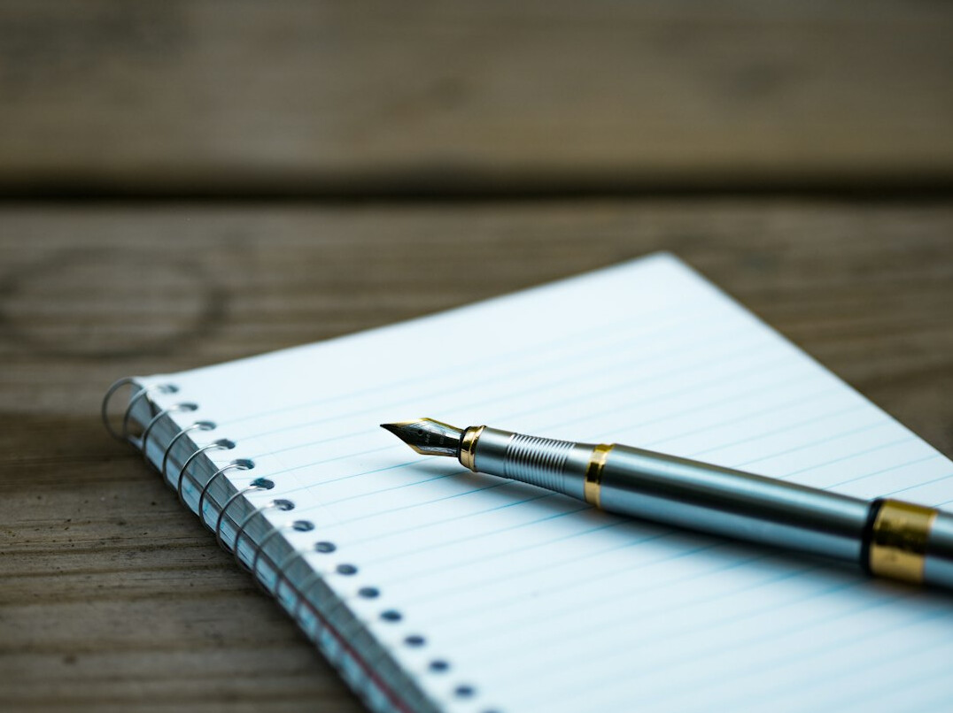 writer editing manuscript